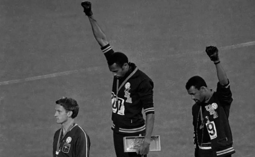 História Hoje Medalhistas punidos por gesto contra desigualdade racial