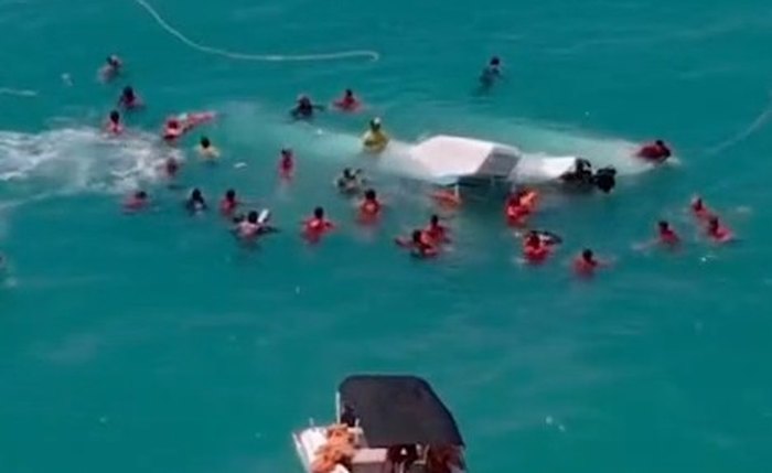 Bombeiros durante o resgate de turistas