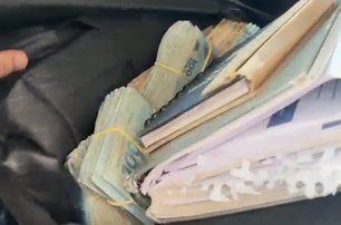 Dinheiro em espécie, cheques e listas com nomes foram encontrados no interior do veículo 