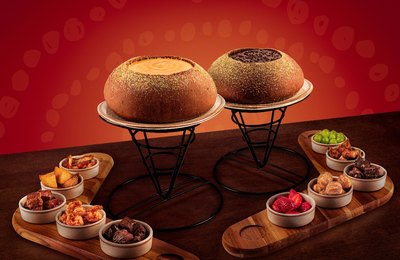 Outback aposta em novos sabores e lança fondues de cinco queijos e brigadeiro
