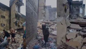 Moradores ajudam bombeiros em resgate de vítimas soterradas após desabamento de prédio / Foto: Foto: Reprodução
