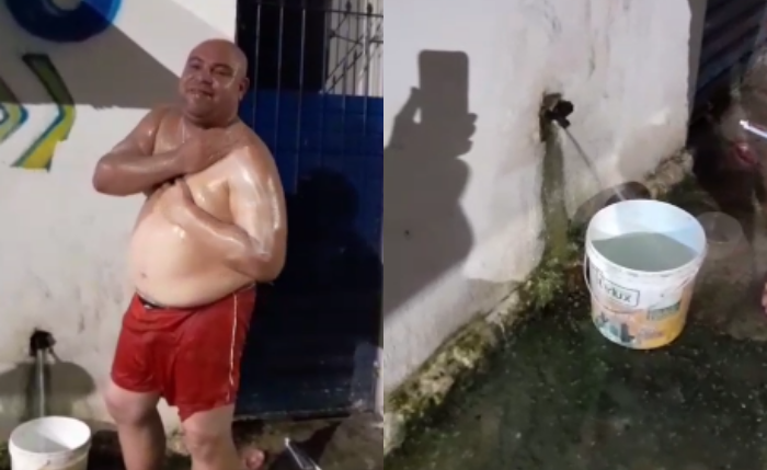 ﻿﻿Vídeo mostra homem tomando banho na rua