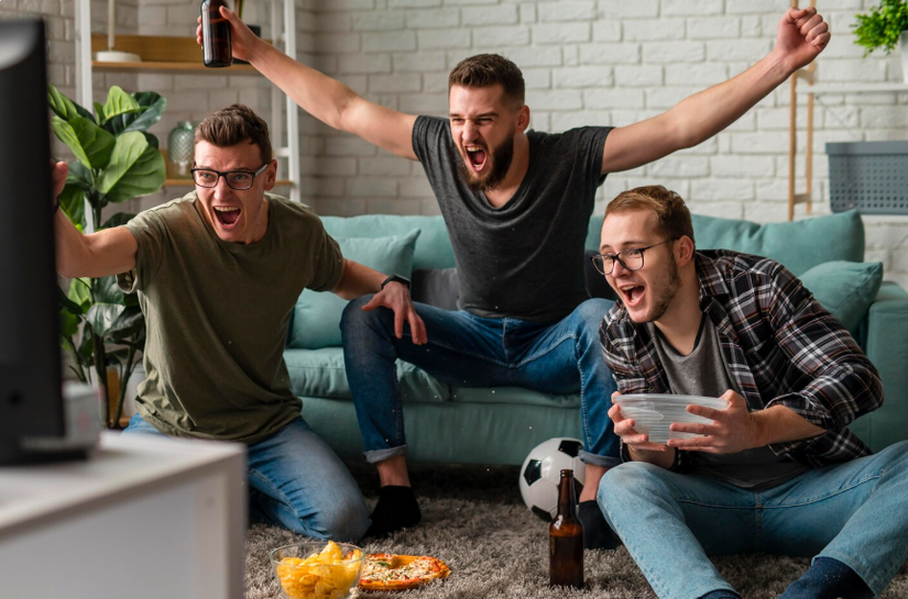 Maratona de futebol na TV pode causar dores nas costas e problemas de postura