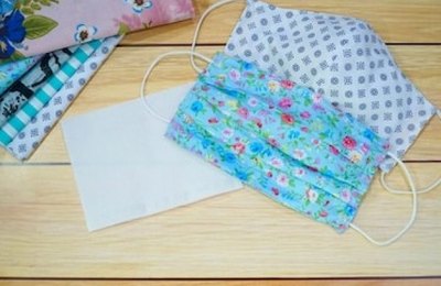 Máscaras de tecido produzidas por alunos do curso de bordado e renda são distribuídas em Maceió