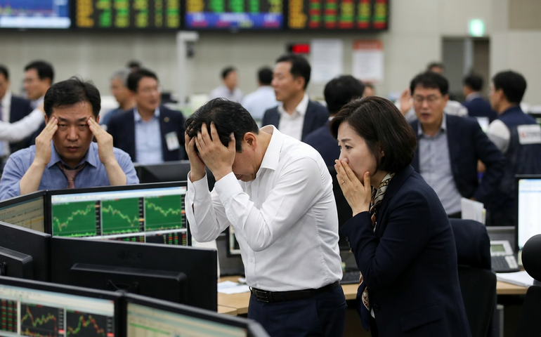 Bolsas asiáticas despencam com guerra no Oriente Médio; Seul tem queda recorde