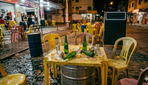 Disparos foram efetuados após discussão entre desafetos dentro de um bar / Foto: Imagem feita por IA