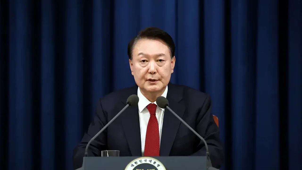 Qual foi a justificativa do presidente da Coreia do Sul para implantar lei marcial?