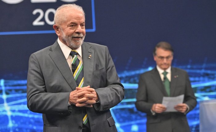 Lula e Bolsonaro durante debate na Band Lula e Bolsonaro durante debate na Band
