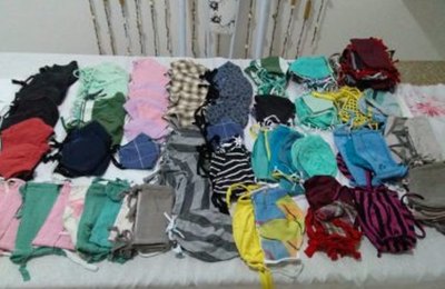 Merendeira produz máscaras para doar a alunos no retorno às aulas da rede municipal
