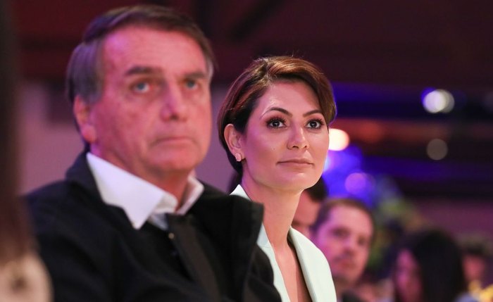 Jair e Michelle Bolsonaro durante evento em 2019