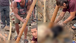 Dois homens retiraram brincos de cadáver que estava na lama