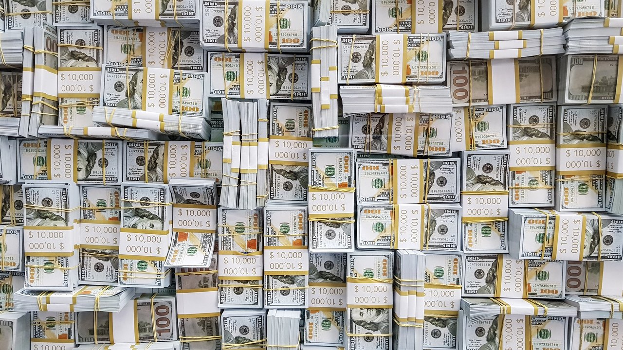 Dólar cai a R$ 5,14 com alívio no mercado externo