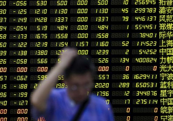 Bolsas da Ásia fecham sem direção única, de olho nos EUA e à espera de PIB chinês