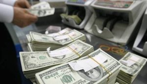 dolar-dolares-moeda-americana-02032022182437696.jpeg / Foto: LEE JAE-WON/REUTER