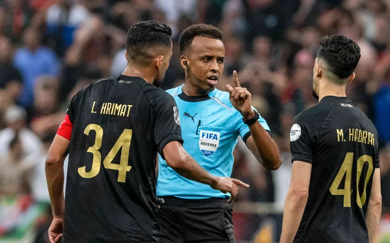 Árbitro somali Artan foi selecionado para apitar um jogo importante da UEFA após ter sido impedido pelos Estados Unidos de participar da Copa do Mundo