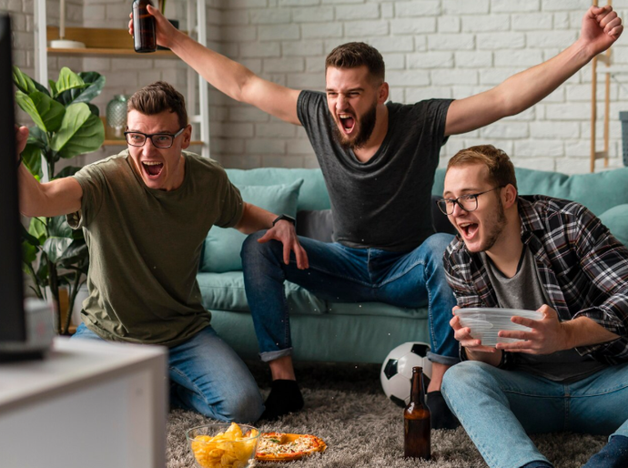 Maratona de futebol na TV pode causar dores nas costas e problemas de postura
